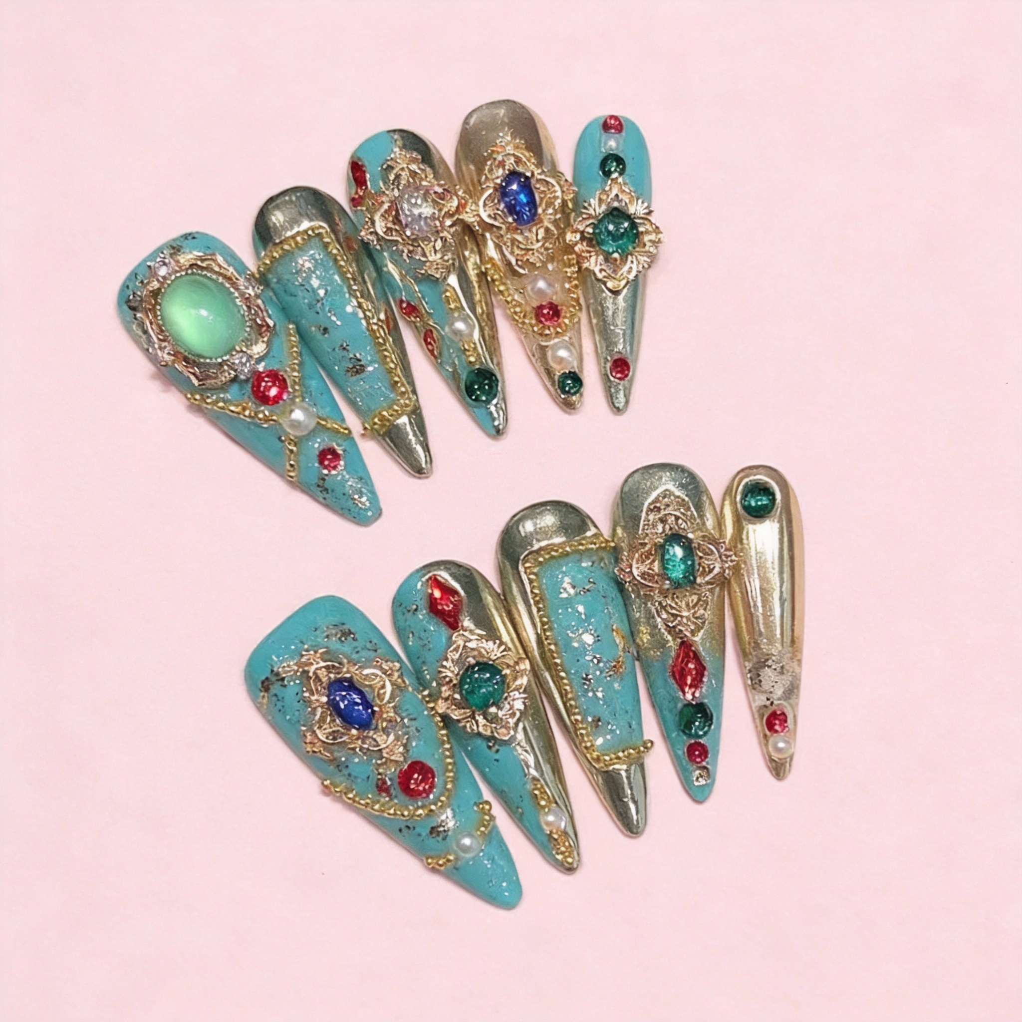 Turquoise Caravan press-on nails with bright blue tones, gold accents, and Central Asian inspired details