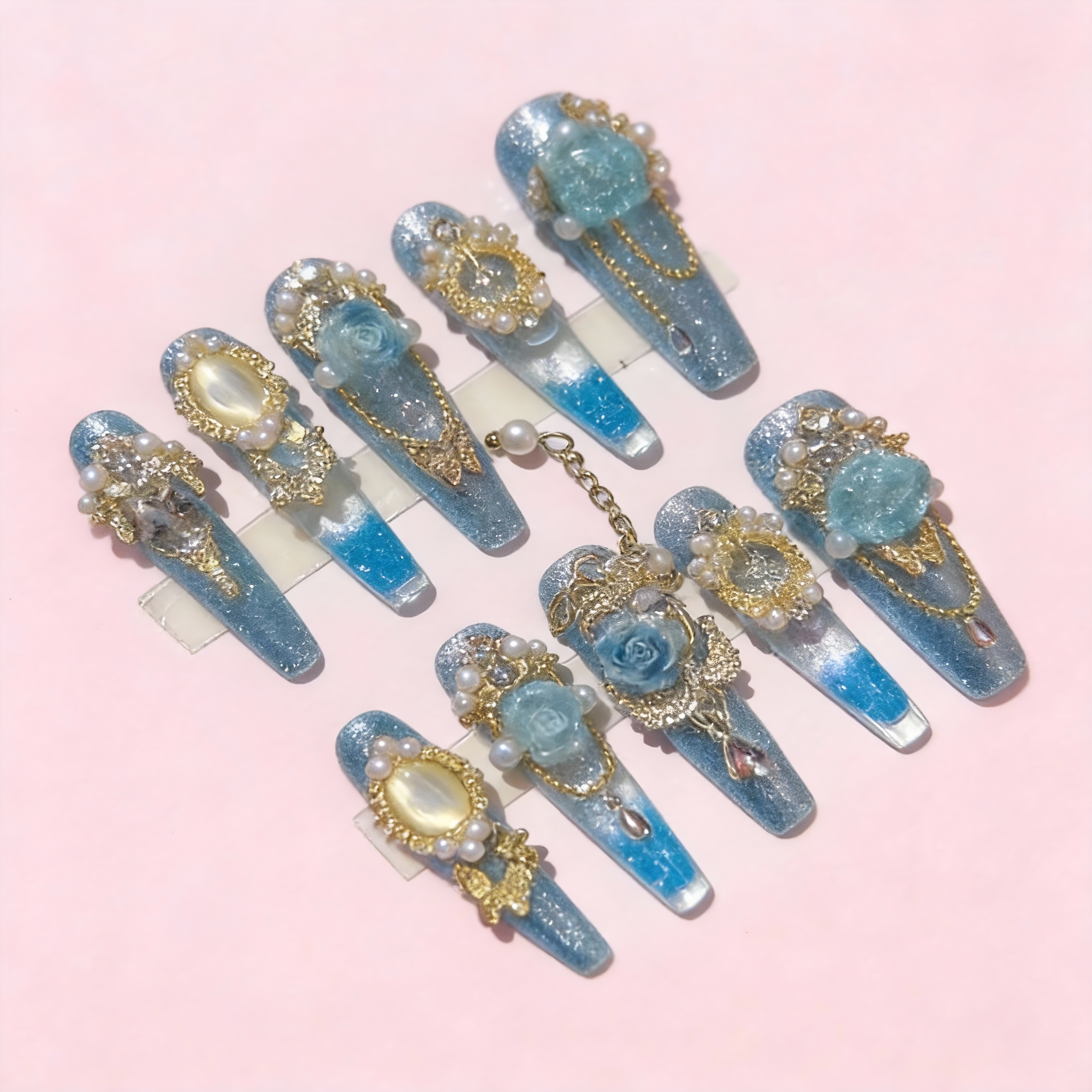 Blue Hour Glitter Jar blue resin liquid press-on nails with floating glitter, pearl accents, and soft gold details