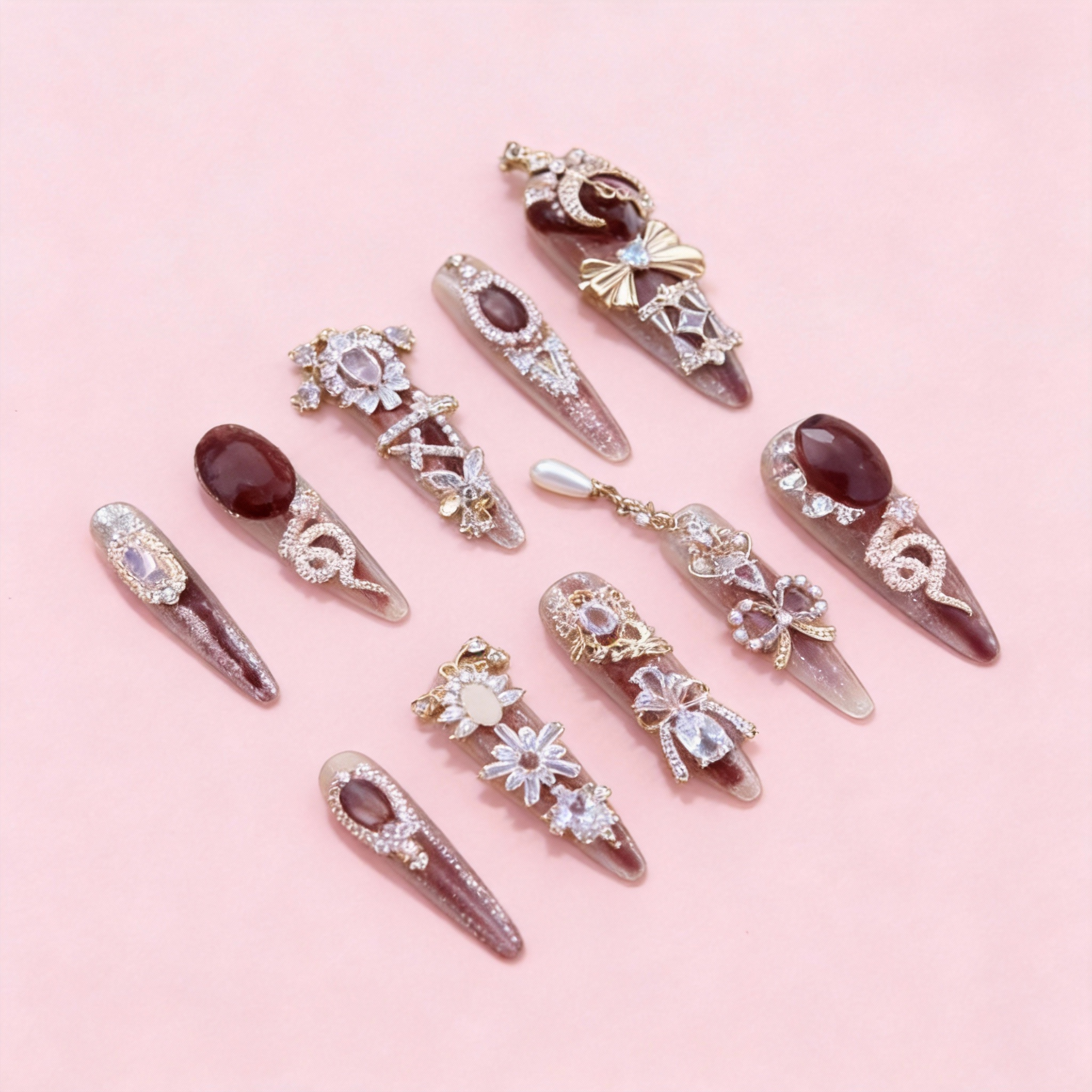 Red-brown press-on nails with floral accents and subtle crystal details, Chestnut Bloom