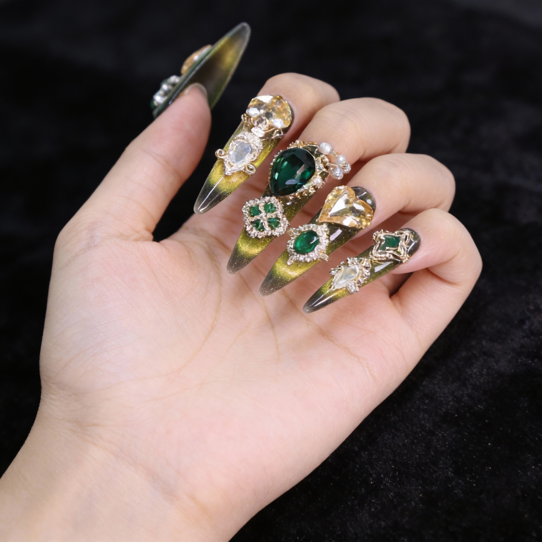 Emerald green statement nails inspired by fine jewelry and imperial design