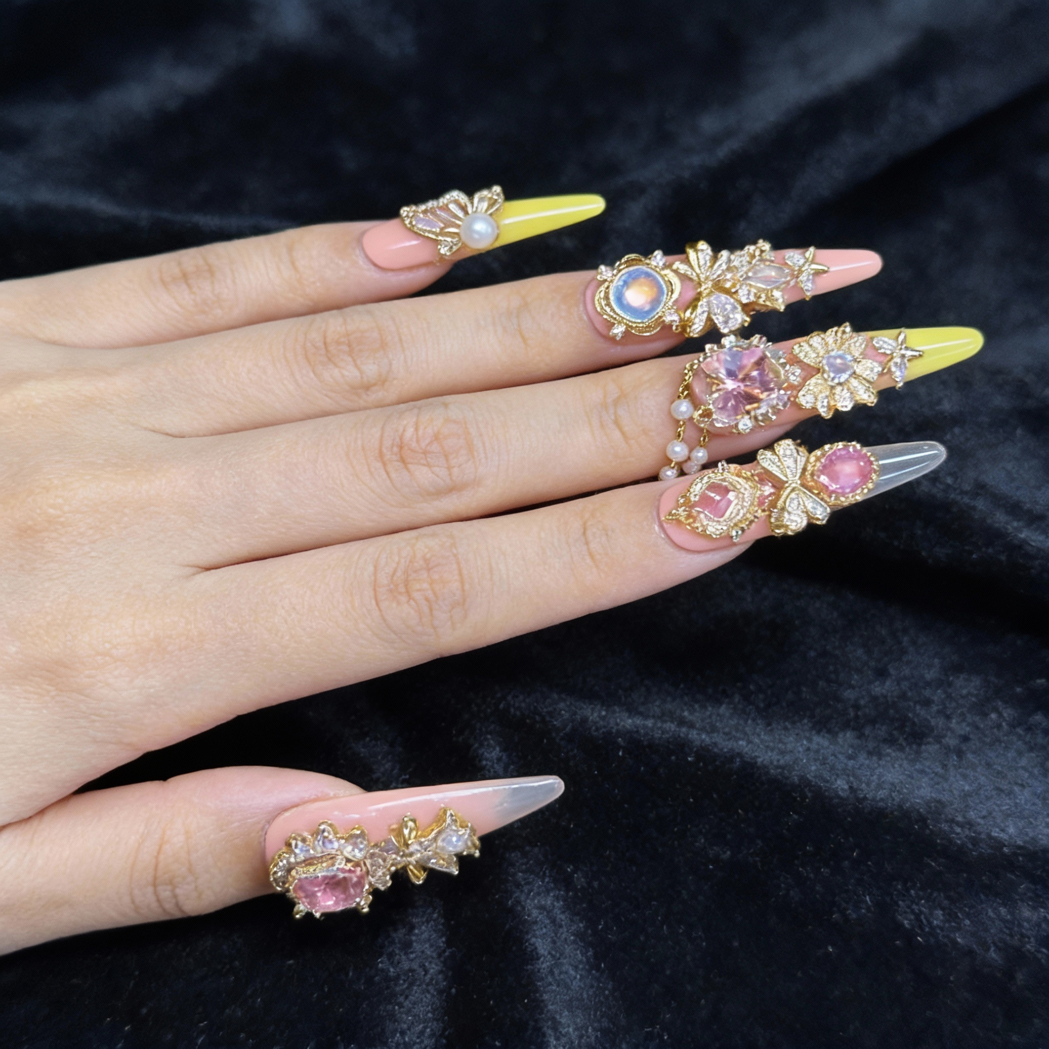 Secret Jewel Box press on nails worn on hand, pink gradient cute nails with heart locket and gemstone details