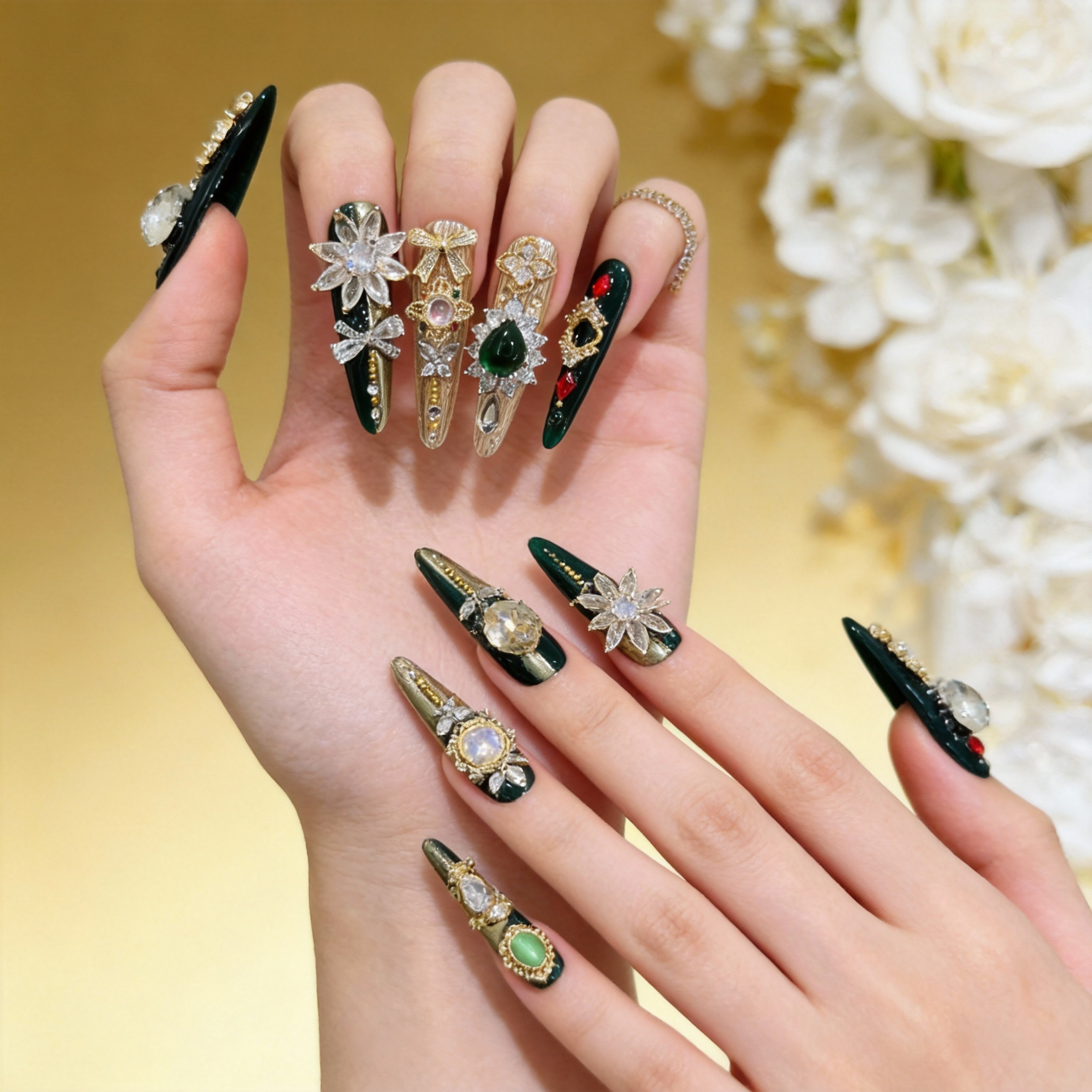 Green and gold press-on nails worn on hand, classic everyday nail look