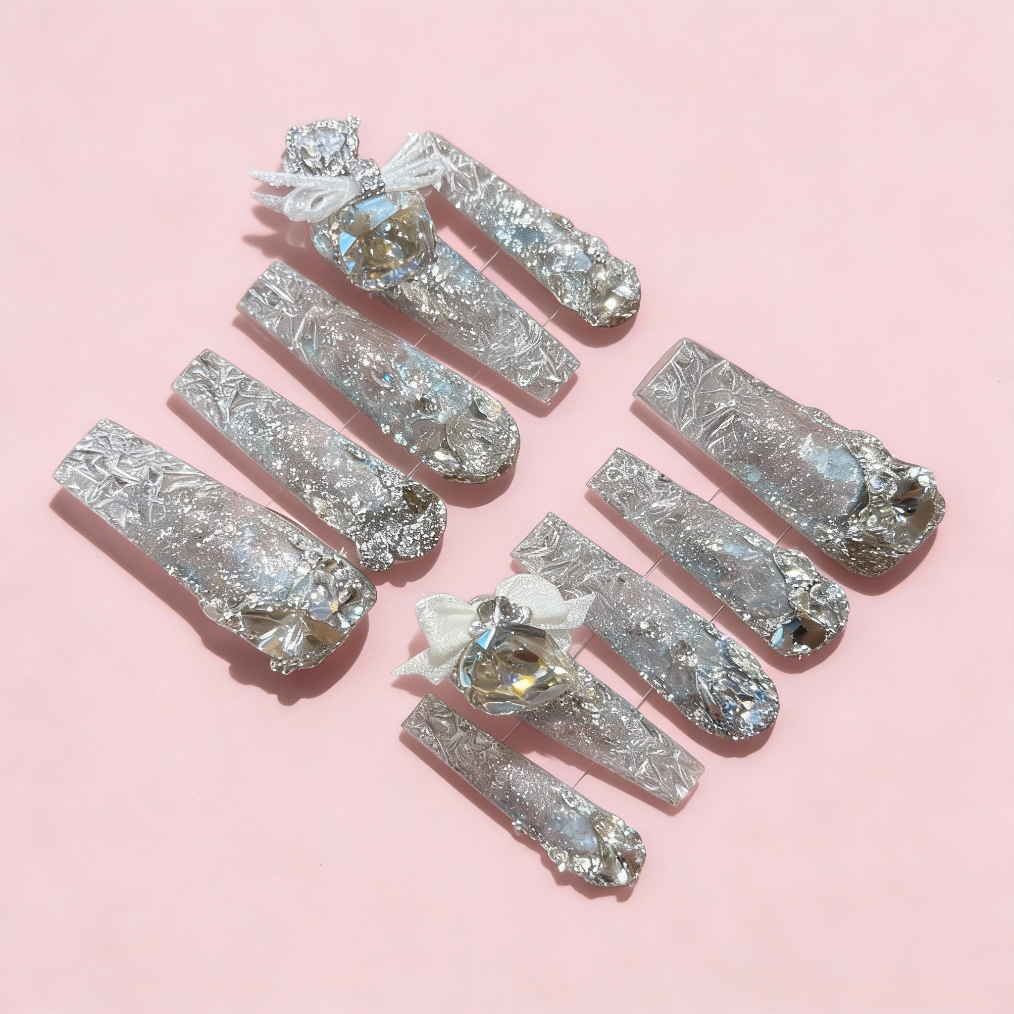 Winter sparkly press on nails with crystal-clear icy base, dense reflective sparkle and frozen-glass textures inspired by glacier ice.