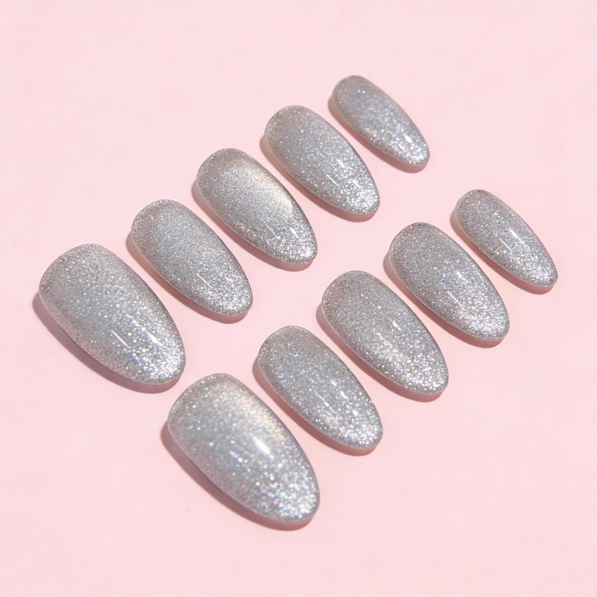 Silver Frost Sparkle press-on nails featuring a cool silver base with fine shimmer, a classic winter sparkly nails design.